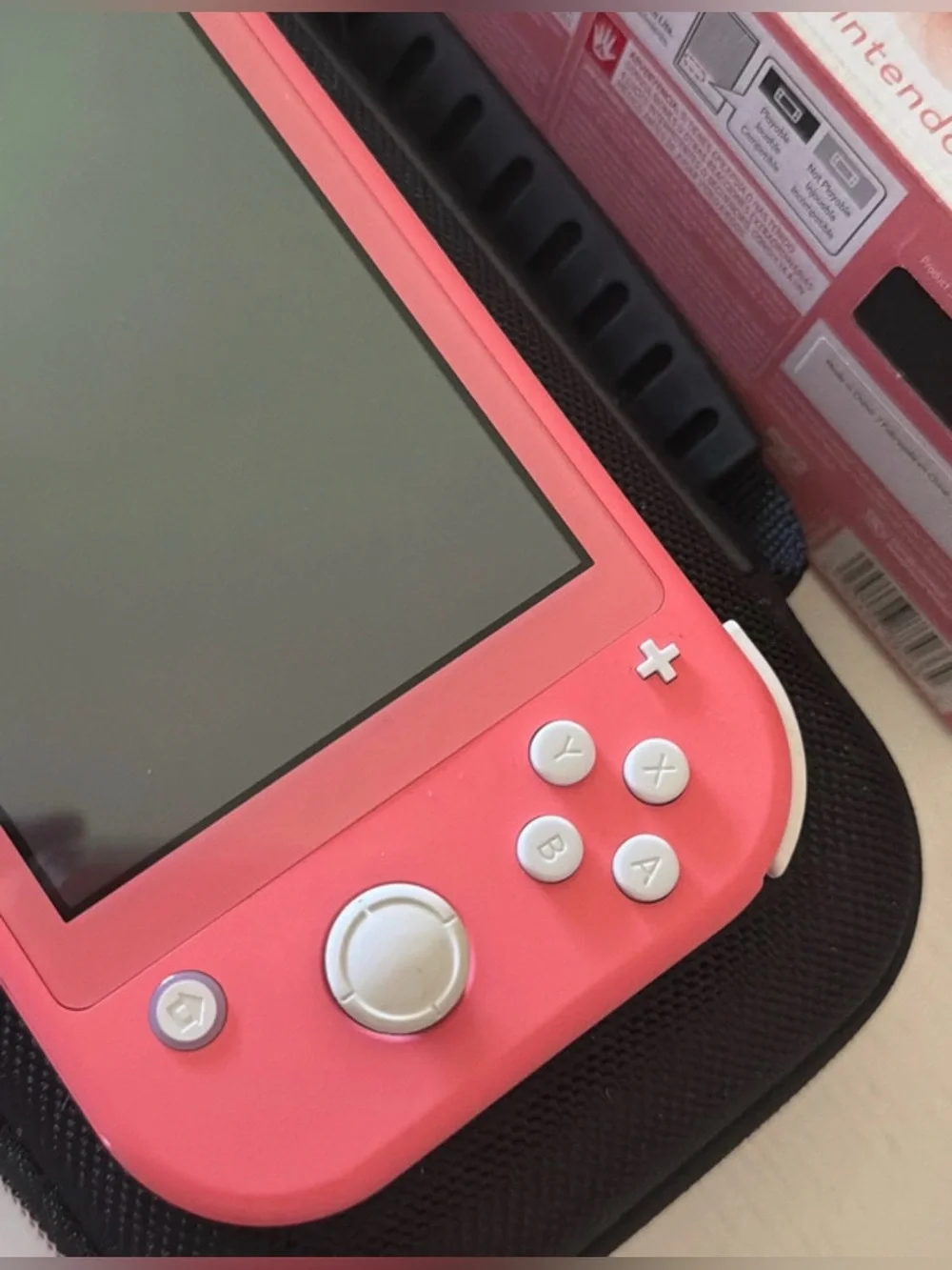 Coral Nintendo switch lite